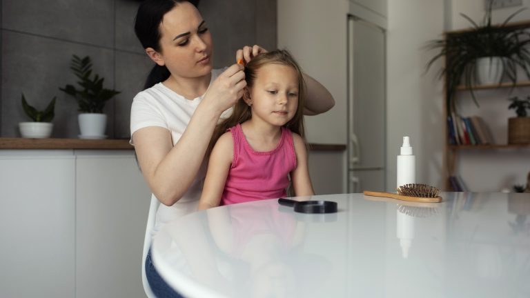 Live Lice Sit Behind the Ears, Not on Top of the Head